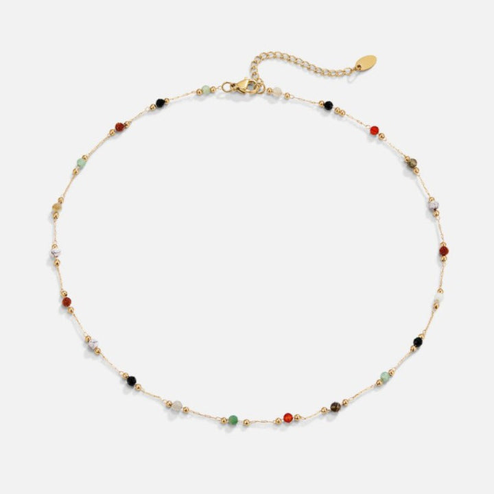 Zlatna choker ogrlica sa šarenim perlicama